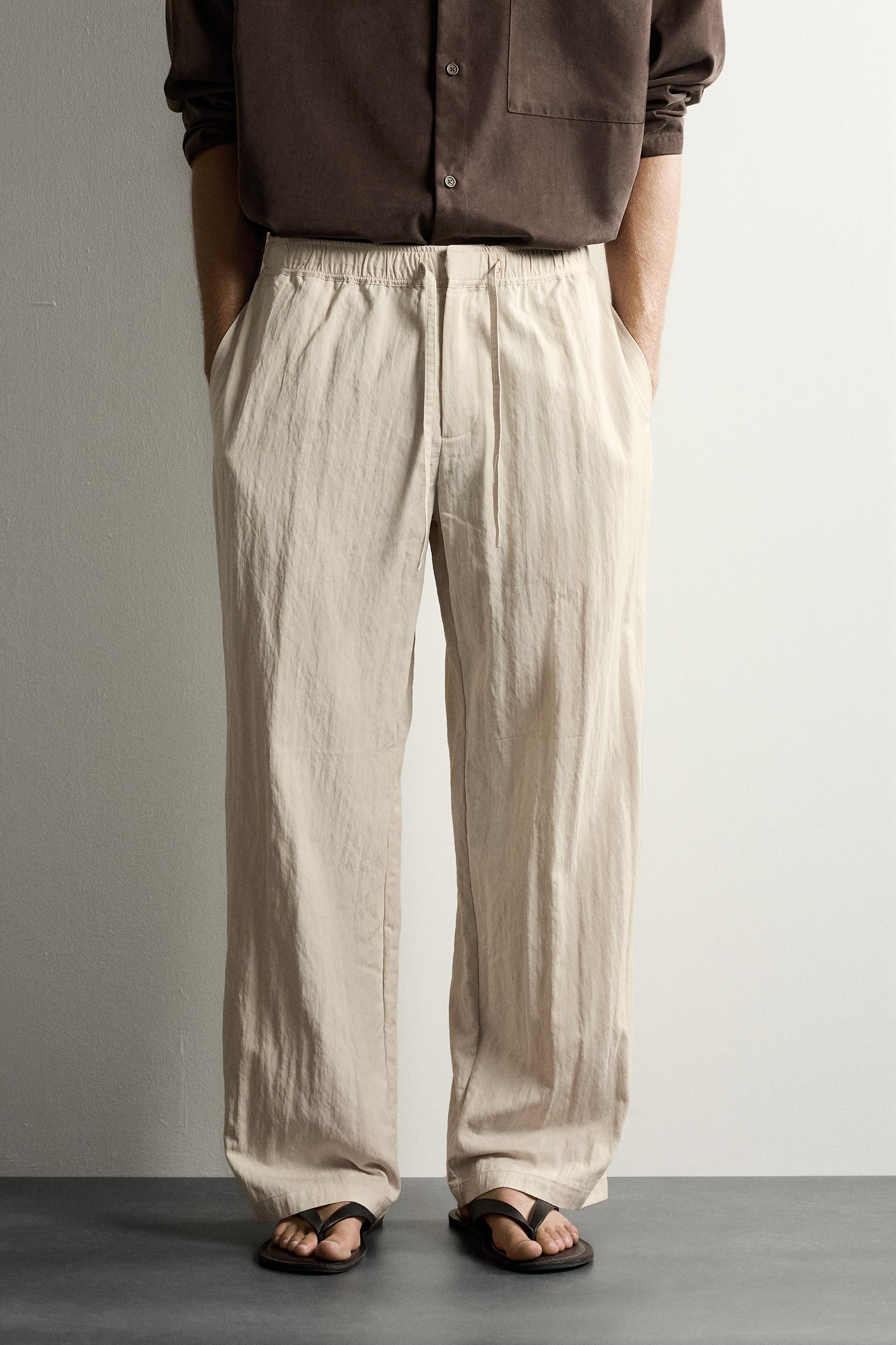 CRINKLED EFFECT TECHNICAL RELAXED FIT PANTS